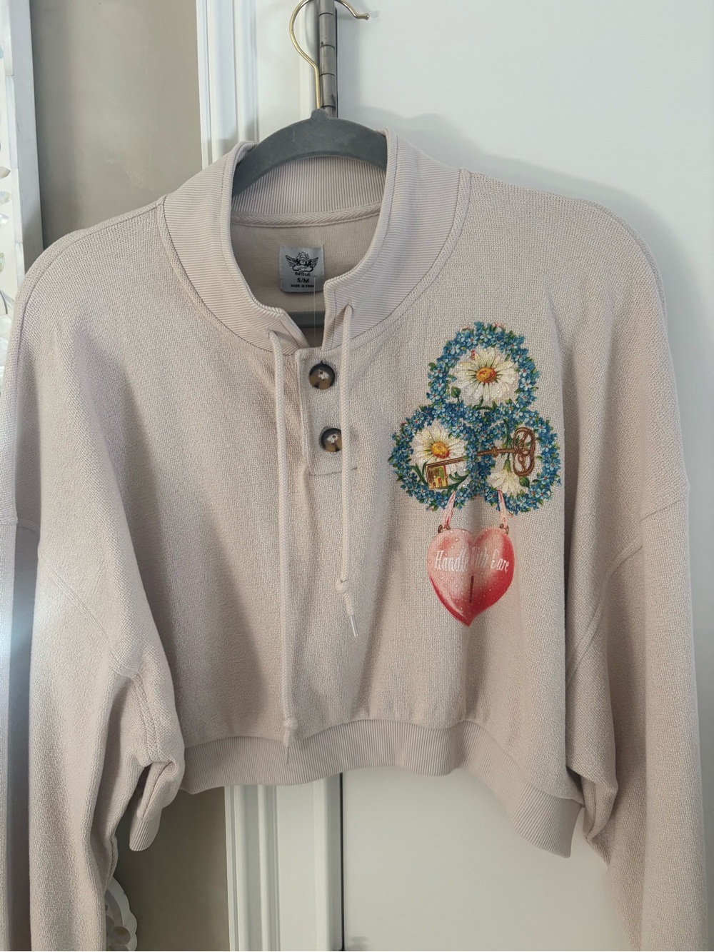 Boys Lie Cream Cropped Henley Sweatshirt with Floral Heart Graphic